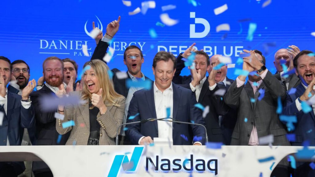 Deep Blue CEO Scott Mitchell rings the opening bell at Nasdaq MarketSite in Times Square.